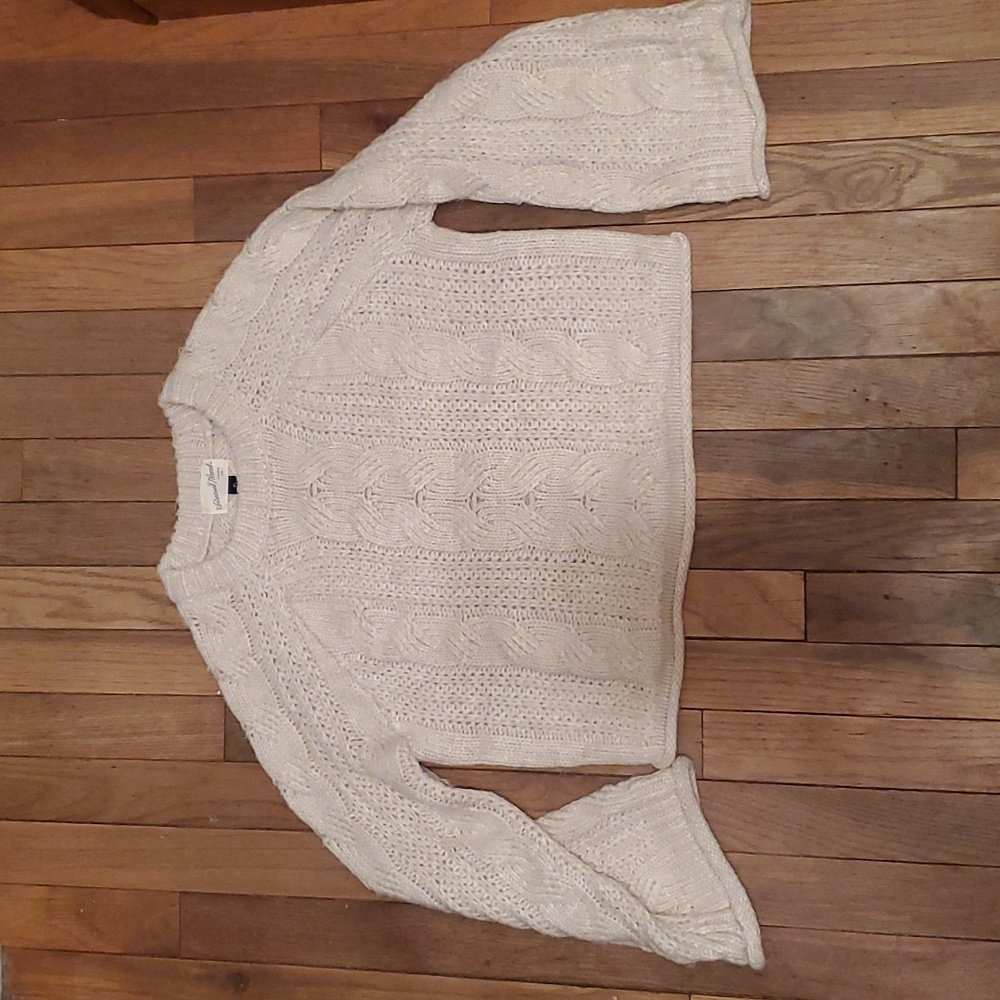 Cropped cable knit sweater
